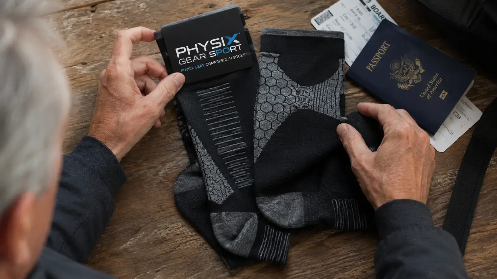 Worn compression socks laid flat after six months of regular use, showing texture still intact